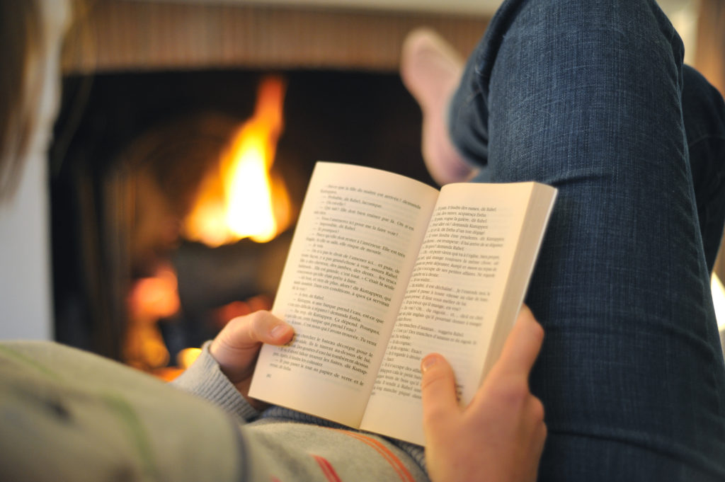 Reading in front of the fire