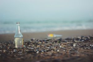 bottle on a beach short story spark from StoryADay
Photo by Vova Drozdey on Unsplash